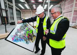 Metropolitan Mayor Cllr Jerry O’Dea is shown the plans by Shay Kinsella of Share A Dream on site at Park Point on the Dublin Road. Picture: Keith Wiseman