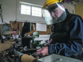 A member of the Shannon Men's Shed working on some wood turning. pic: Cian Reinhardt