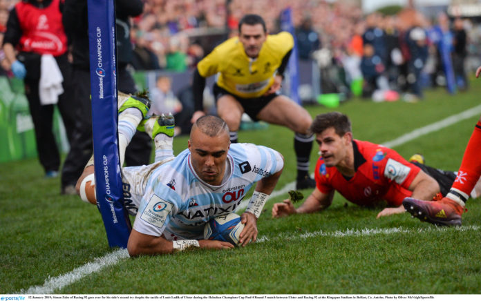 Simon Zebo of Racing 92 goes over for his side's second try despite the tackle of Louis Ludik of Ulster during the Heineken Champions Cup Pool 4 Round 5 match between Ulster and Racing 92 at the Kingspan Stadium in Belfast, Co. Antrim. Photo by Oliver McVeigh/Sportsfile