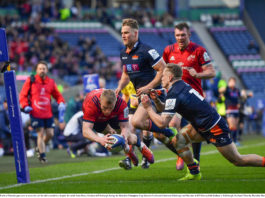 Keith Earls of Munster goes over to score his and his side's second try despite the tackle from Darcy Graham of Edinburgh during the Heineken Champions Cup Quarter-Final match between Edinburgh and Munster at BT Murrayfield Stadium in Edinburgh, Scotland. Photo by Brendan Moran/Sportsfile