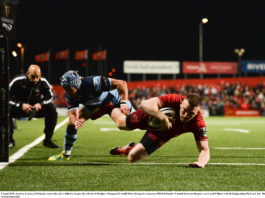 Andrew Conway of Munster scores his side's fifth try despite the efforts of Matthew Morgan of Cardiff Blues during the Guinness PRO14 Round 19 match between Munster and Cardiff Blues at Irish Independent Park in Cork. Photo by Diarmuid Greene/Sportsfile