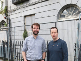 Cllr Joe Leddin (right) with his cousin and Green Party local election candidate Brian Leddin at the former Leddin family home in Catherine Street. Photo: Brendan Gleeson limerick post newspaper