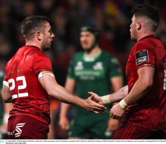 JJ Hanrahan of Munster celebrates with team-mate Calvin Nash after scoring his side's third try during the Guinness PRO14 Round 21 match between Munster and Connacht at Thomond Park in Limerick. Photo by Diarmuid Greene/Sportsfile