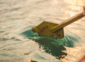 yellow boat paddle