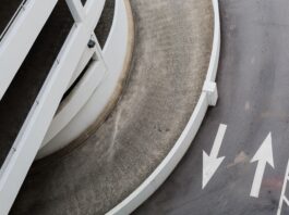 aerial photography of road with arrow signs